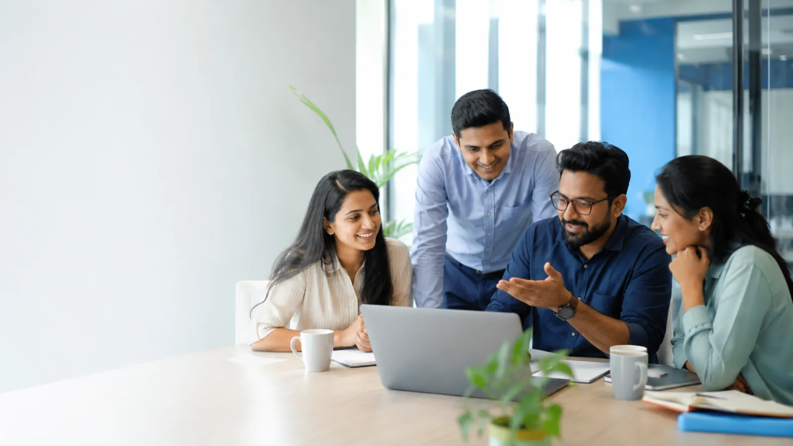 HR and finance team collaborating in a modern office